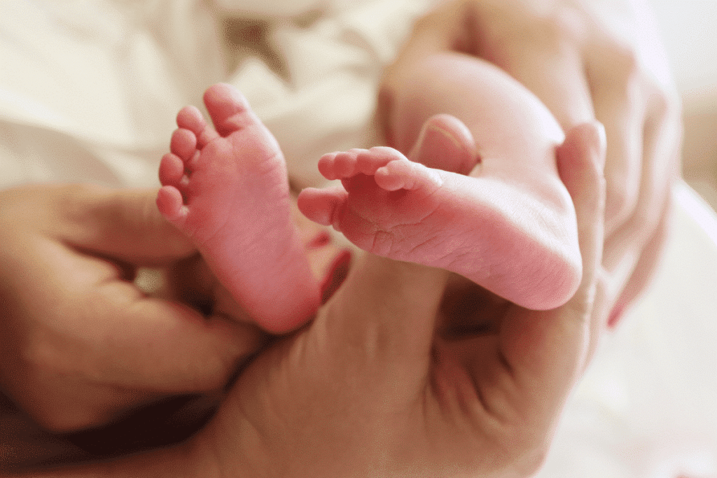 The foot of a white new born baby