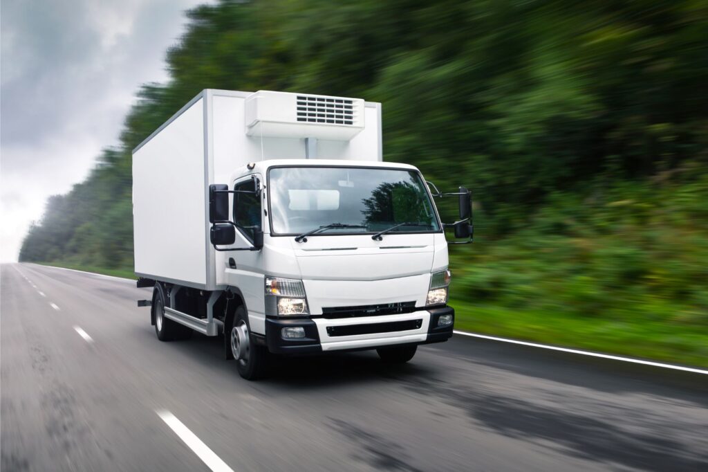 delivery truck driving on road - delivery truck accident lawyer in west virginia